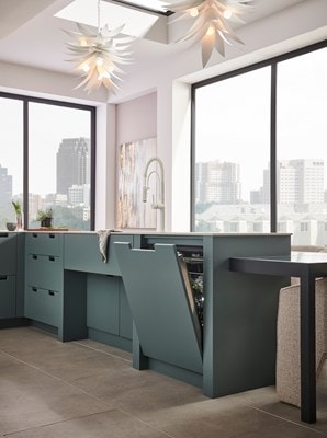 Cove panel ready dishwasher matched elegantly with the cabinetry in the kitchen.