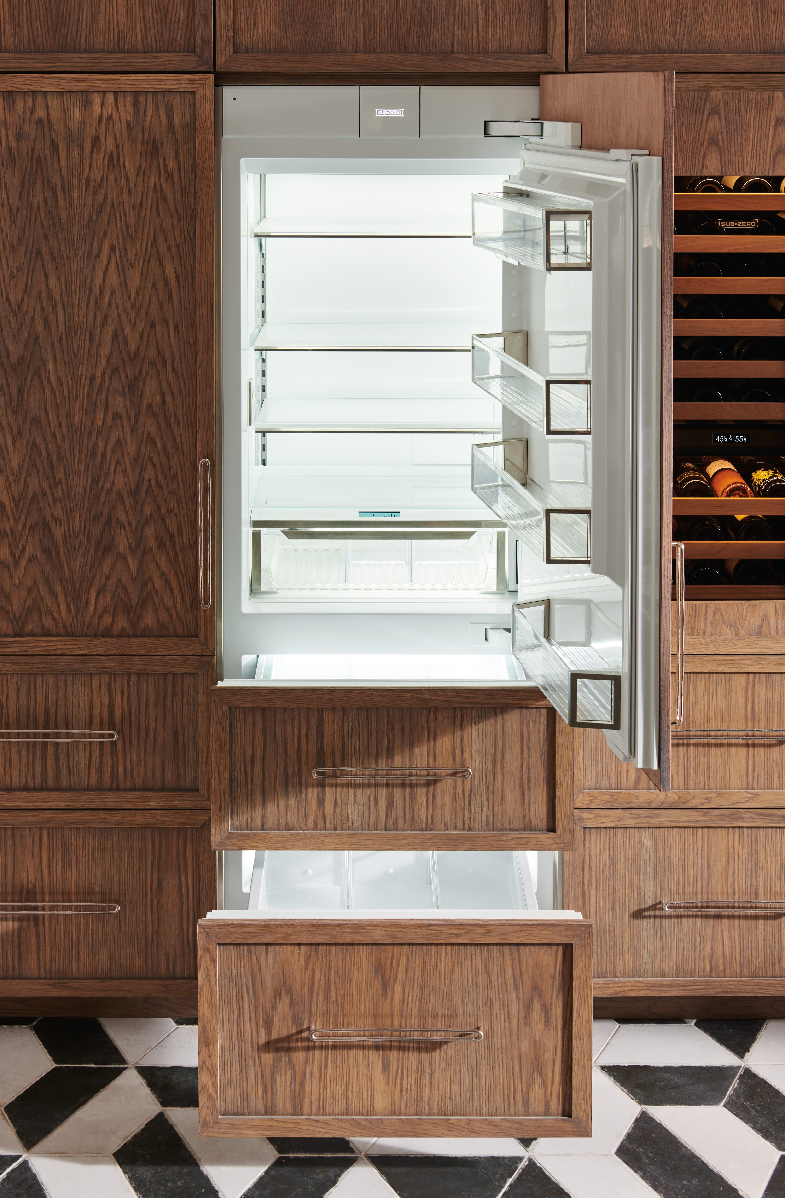 Sub-Zero 30 Inch Tall Refrigerator with Internal Dispenser