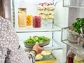 Salad going in 24-inch Designer all-refrigerator 