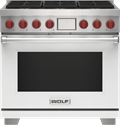 Wolf 36" 6 Burner Dual Fuel Range (DF36650/WH/P) featuring white accent colored door and signature red Wolf knobs.