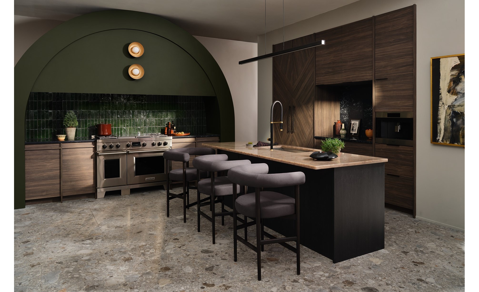 Wolf 24 Inch E Series Transitional Coffee System shown centered in a large forest green arched kitchen design with custom racing green backsplash and custom handleless wood cabinetry