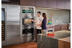 Use and care product demonstration featuring Wolf cooking with Chef at Sub-Zero, Wolf and Cove Showroom