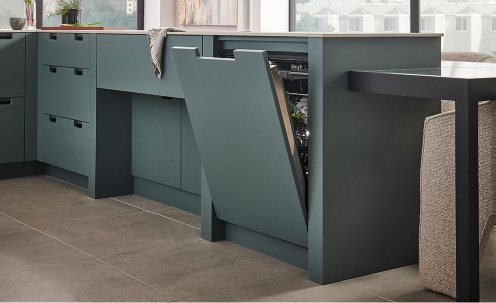Cove panel ready dishwasher matched elegantly with the cabinetry in the kitchen.