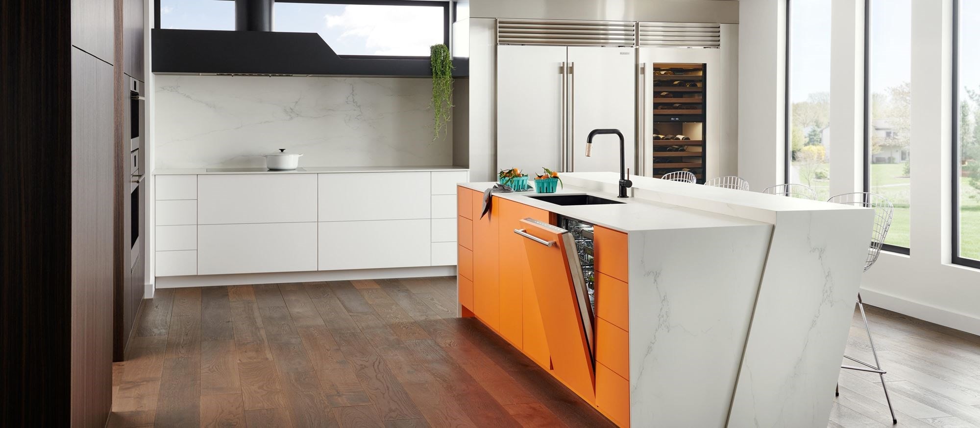 24 inch Panel Ready Dishwasher (DW2451) by Cove Dishwashers shown in a Euro kitchen design featuring white cabinets and marble countertops.