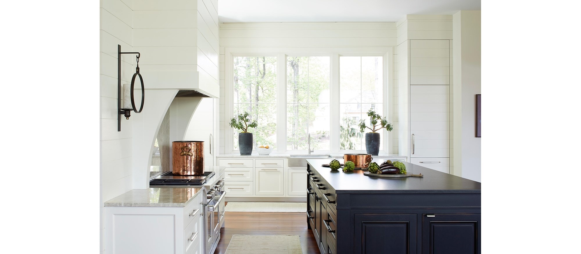 Wolf 48" 6 Burner and Griddle Dual Fuel Range in Brookhaven Residence by Karen Ferguson.