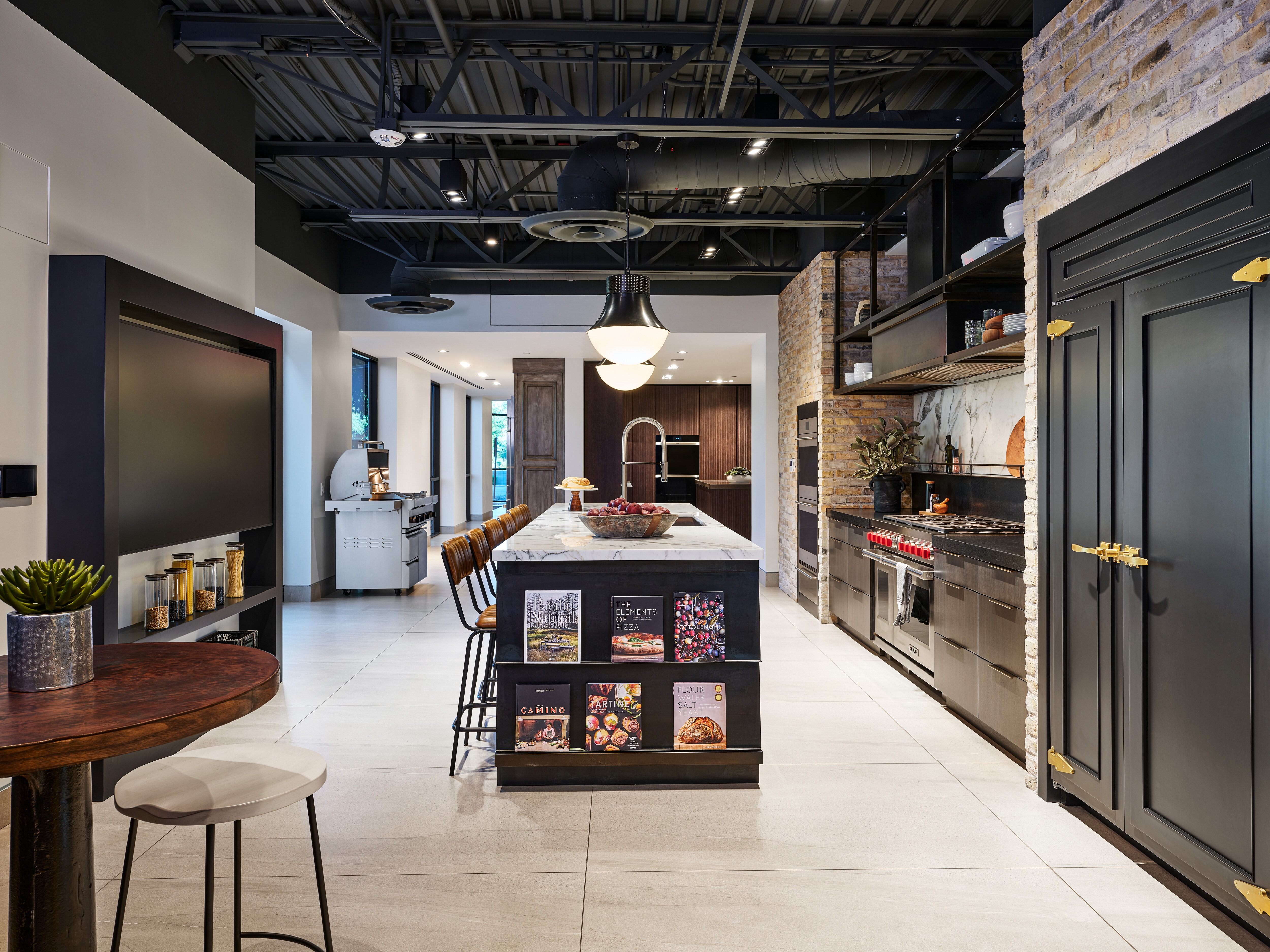 Sub-Zero, Wolf, and Cove appliances litter this traditional kitchen in our Scottsdale, Arizona, showroom.