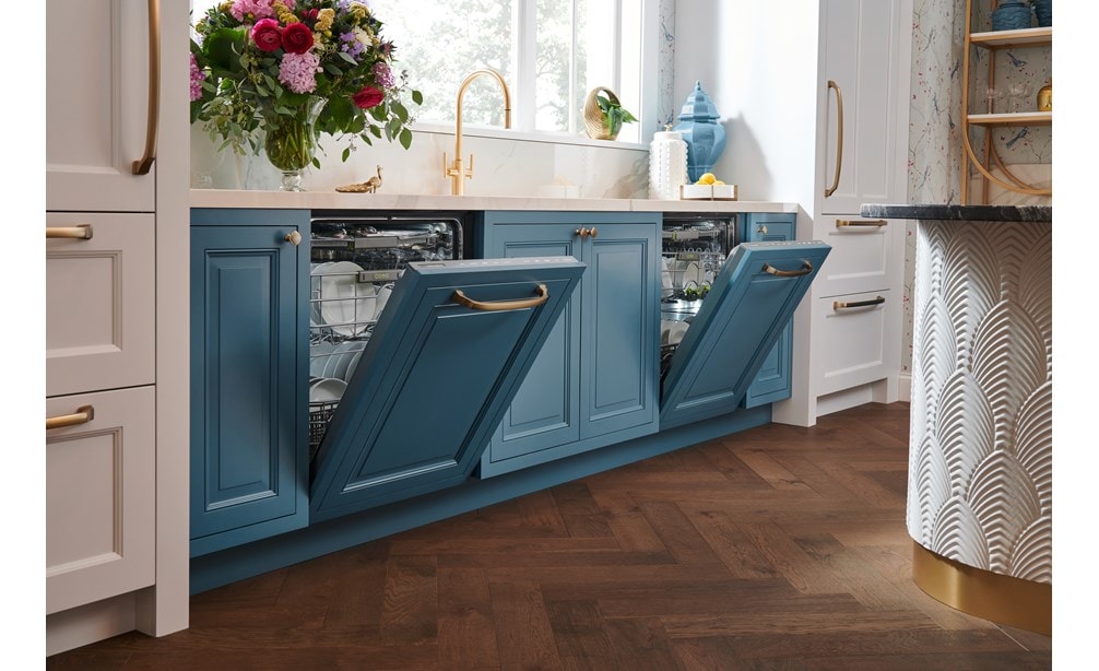 Dual 24 inch Panel Ready Dishwashers by Cove Dishwashers featuring cusomt panels matching soft blue kitchen cabinets.