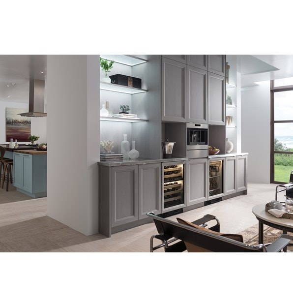 The Sub-Zero 24" Undercounter Beverage Center Panel Ready (UC- 24BG/O) paired with 24" Undercounter Wine Storage (424G/O)