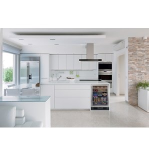 Wolf 36" Contemporary Induction Cooktop (CI365C/B) set in large kitchen featuring smooth cabinets with 42" Cooktop Island Hood (VI42B)