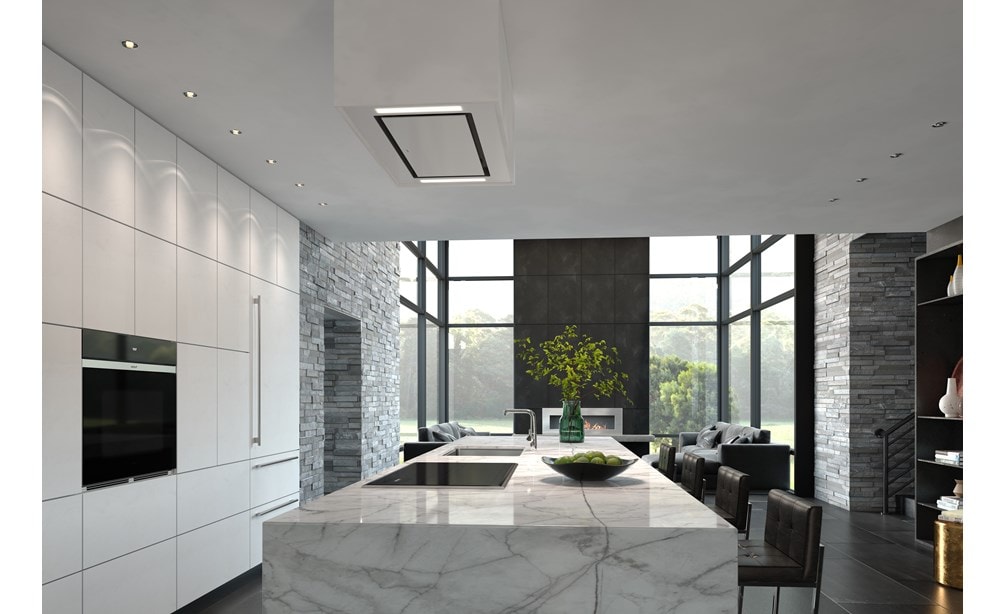 Wolf 36" Transitional Induction Cooktop pictured in a modern kitchen design featuring gray and white marble countertop and smooth white handleless cabinets.