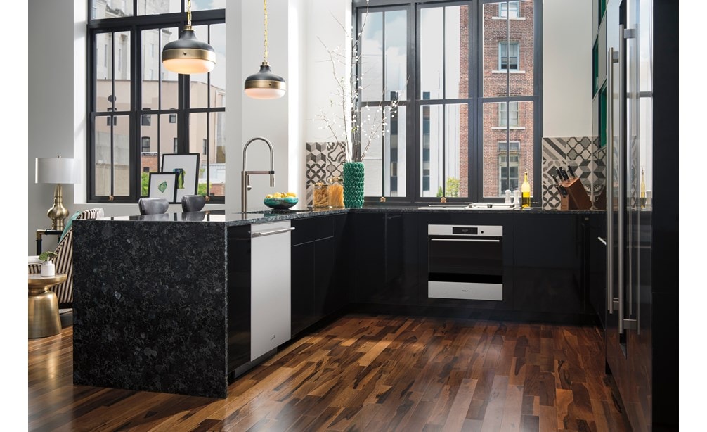 Wolf 24" E Series Transitional Built-In Single Oven (SO2450TE/S/T) under Volga blue granite countertops and above Brazilian hickory flooring