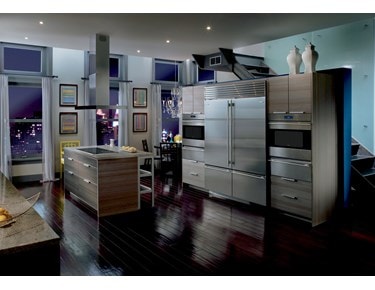 Pair of Wolf 30" E Series Transitional Classic Single Ovens (SO30TE/S/TH) on each side of Sub-Zero 30" Classic Over Under Refrigerator (BI-30U/S)