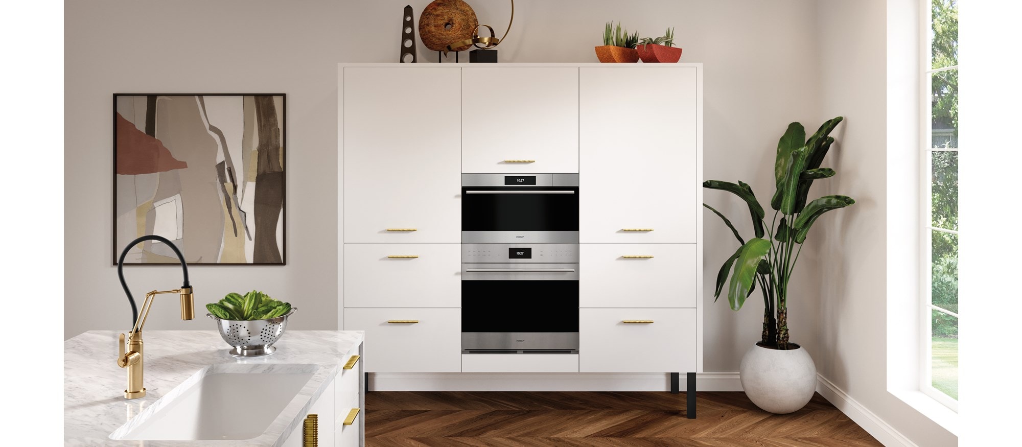 Wolf 30" E Series Transitional Convection Steam Oven (CSO3050TE/S/T) immersed in a sleek white French kitchen
