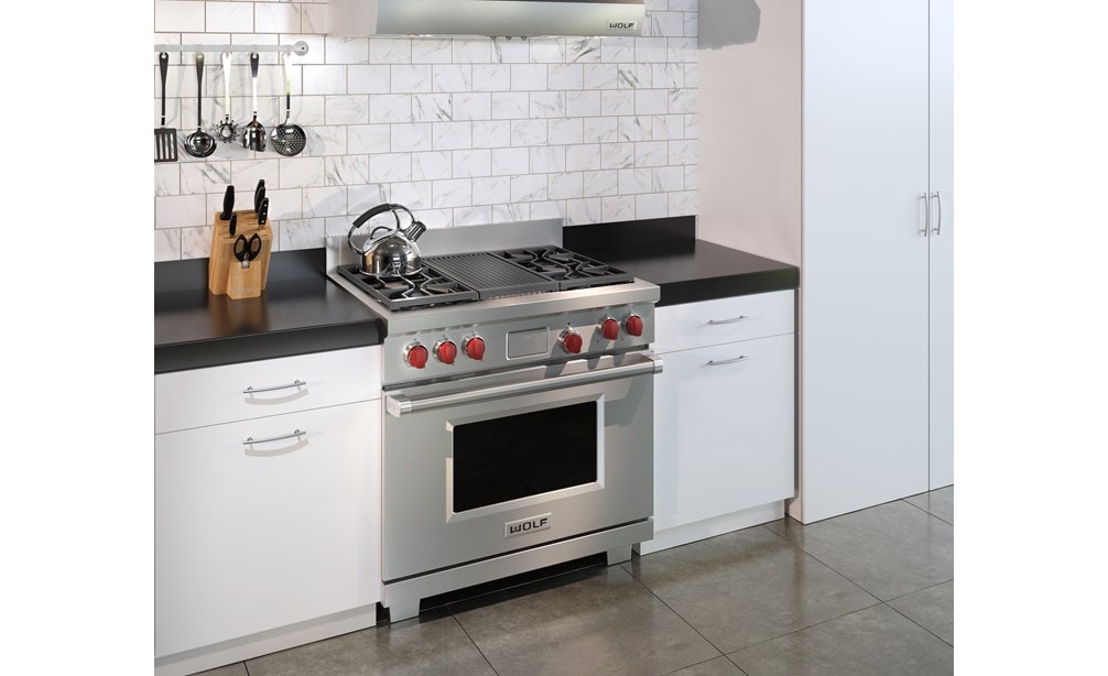The Wolf 36" Dual Fuel Range 4 Burner Infrared Charbroiler (DF364C) shown in a clean contemporary kitchen design.
