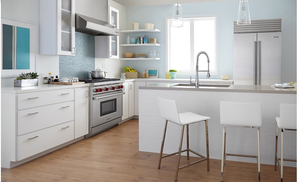 The Wolf 36" Dual Fuel Range 4 Burner Infrared Griddle (DF364G) with Sub-Zero 36" Classic French door Refrigerator Freezer (BI-36UFD/S)