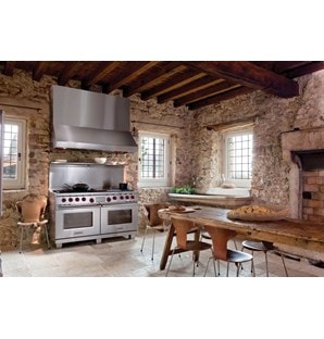 The Wolf 60" Dual Fuel Range 6 Burner Infrared Charbroiler Griddle (DF606CG) shown with Wolf 60" Pro Wall Hood - 27" Depth (PW602718)