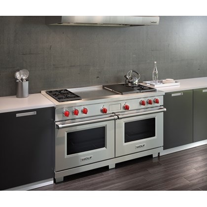 The Wolf 60" Dual Fuel Range 4 Burner Infrared Charbroiler French Top (DF604CF) visually satisfies when used with deep toned kitchen design
