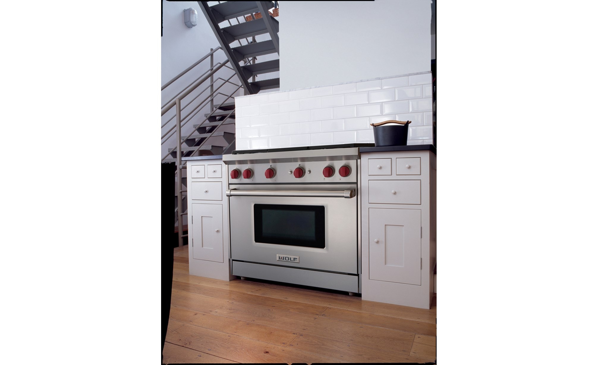 The Wolf 36" Gas Range 6 Burner (GR366) Rangetop shown blending seamlessly into a simple and elegant kitchen design.