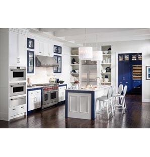 The Wolf 48" Gas Range 6 Burner Infrared Charbroiler (GR486C) paired with Sub-Zero 36" Classic Side by Side Refrigerator Freezer (BI-36S/S)