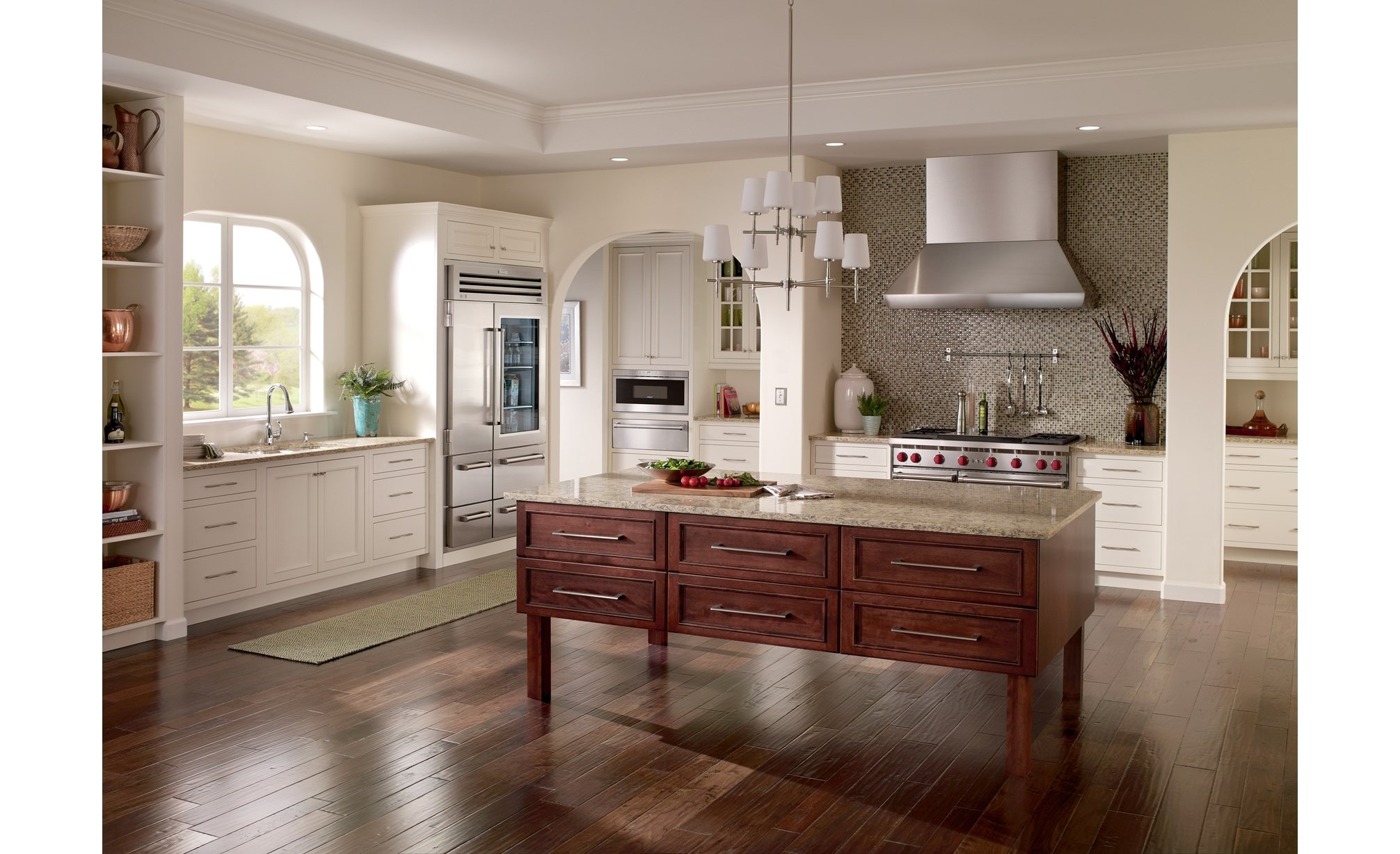 The Wolf 48" Gas Range 4 Burner (GR484DG) paired with Sub-Zero 48" Professional Side-by-Side Glassdoor Refrigerator Freezer (648PROG)