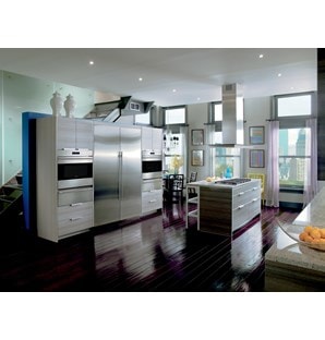 The Wolf 45" Cooktop Island Hood (VI45G) displayed in a large open modern kitchen featuring glossy wood flooring
