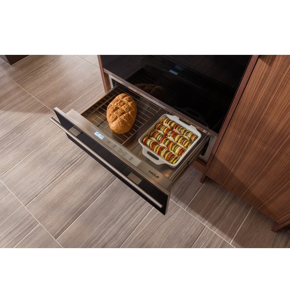 The Wolf 30" Warming Drawer (WD30) shown displaying hidden electronic controls that are easy to see and use when you pull out the drawer.