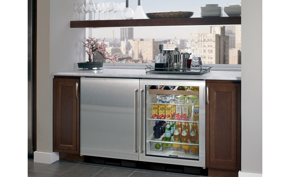 Sub-Zero 24" Undercounter Refrigerator Freezer (UC-24CI) paired with 24" Undercounter Beverage Center (UC-24BG/S) provides refrigeration in any room.