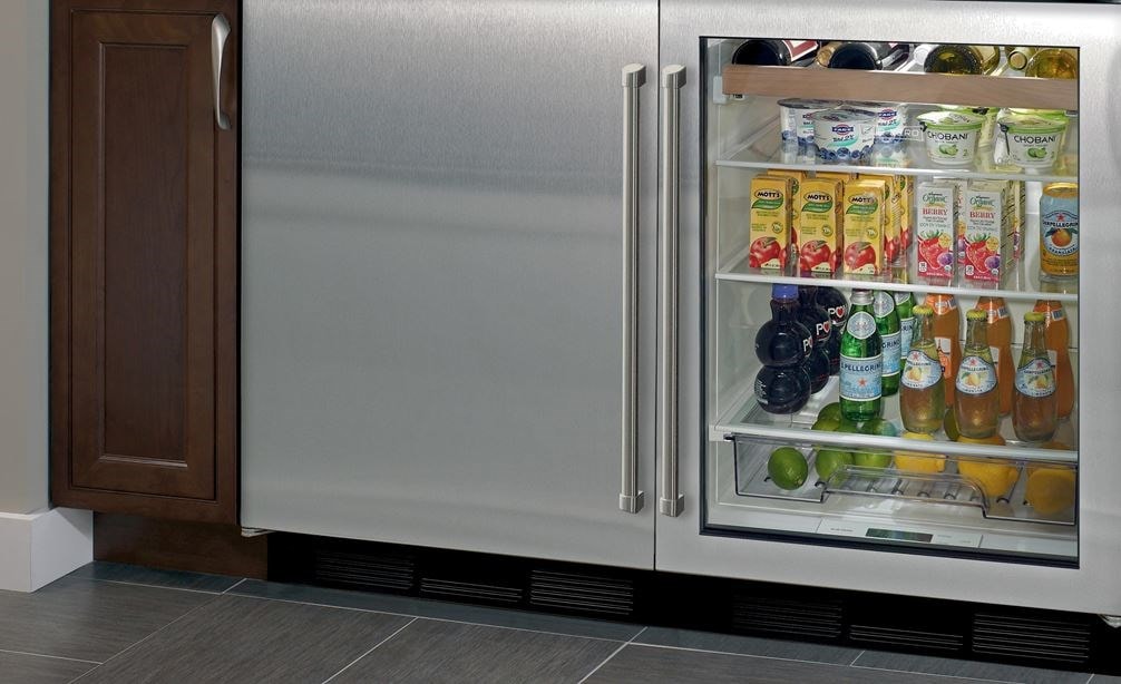 Sub-Zero 24&quot; Undercounter Refrigerator Freezer (UC-24CI) paired with 24&quot; Undercounter Beverage Center (UC-24BG/S) provides refrigeration in any room.
