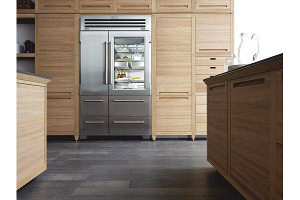 Sub-Zero Pro Series Stainless Steel Refrigerator displayed in kitchen with light wood cabinetry