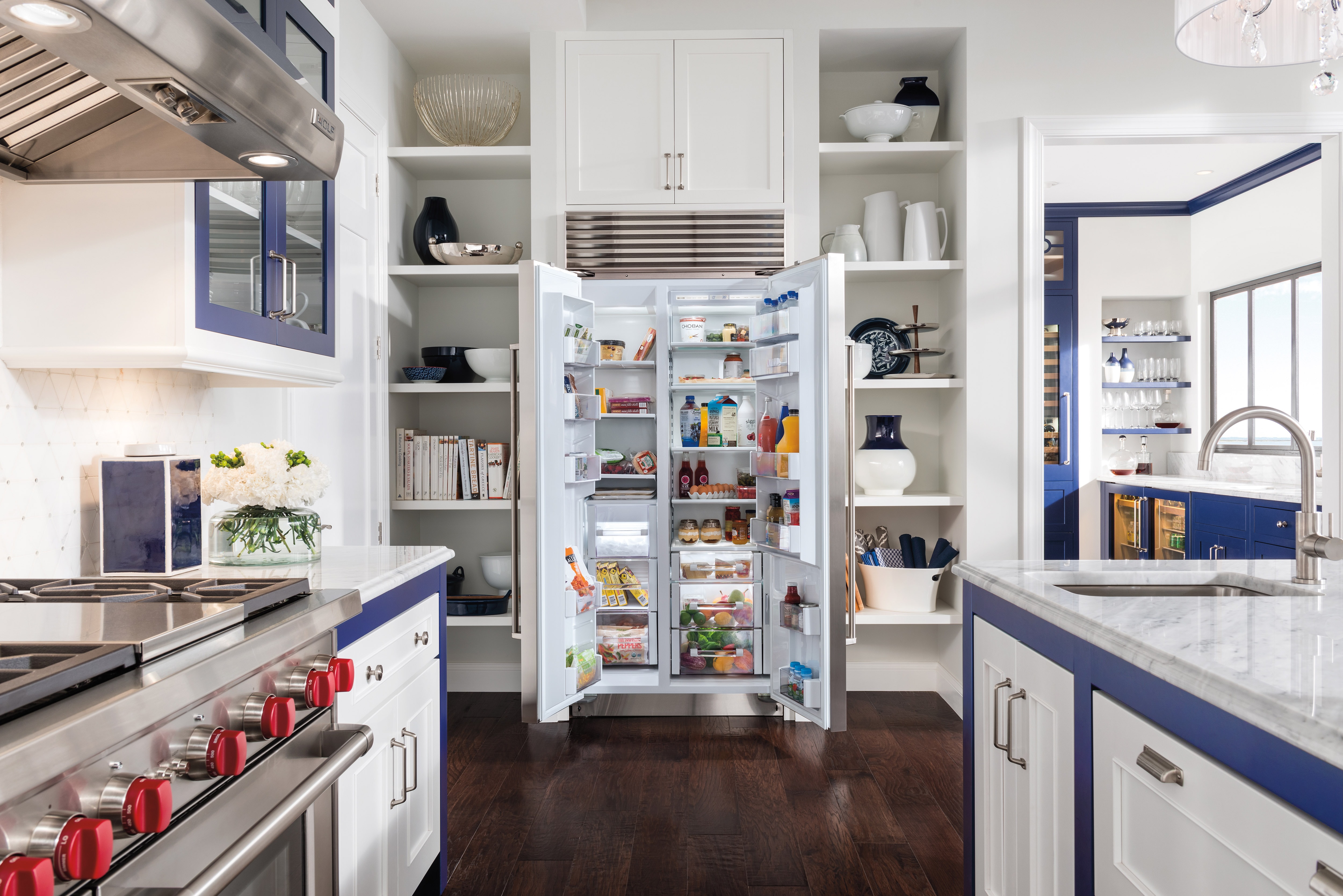 Sub-Zero 36" Classic Side by Side Refrigerator Freezer (BI-36S/S) Formerly Built-In with Wolf 48" Pro Wall Hood - 24" Depth (PW482418)