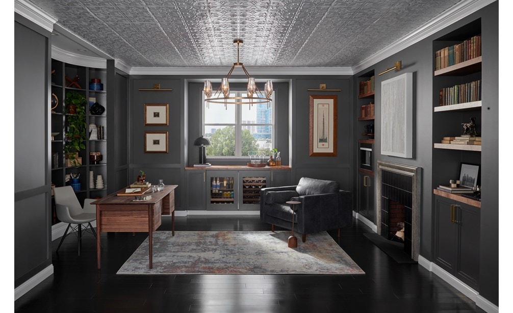 Sub-Zero 24" Designer Undercounter ADA Height Beverage Center - Panel Ready (DEU2450BG/ADA) shown in black custom cabinetry in dark home office 