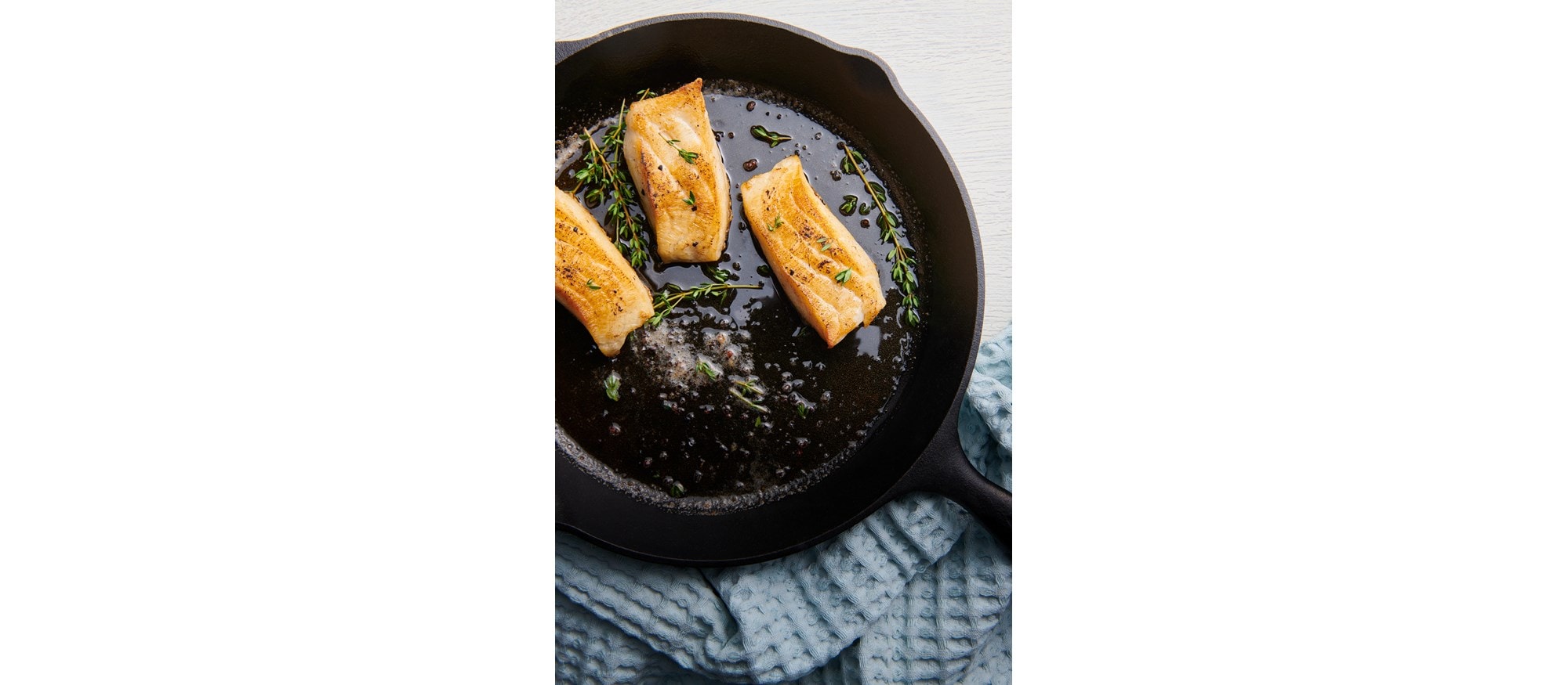 Easy and delicious Sea Bass with Chive-Garlic Compound Butter recipe using the Bake Mode setting of your Wolf Oven