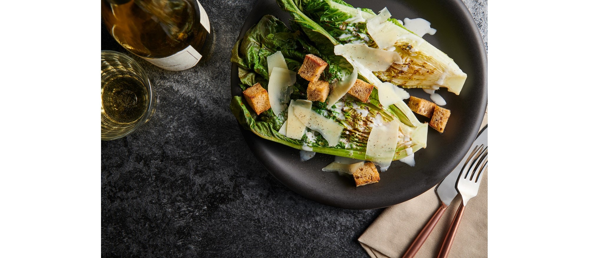 Easy and delicious Grilled Ceasar Salad recipe using the Charbroiler Mode setting of your Wolf Dual Fuel Range
