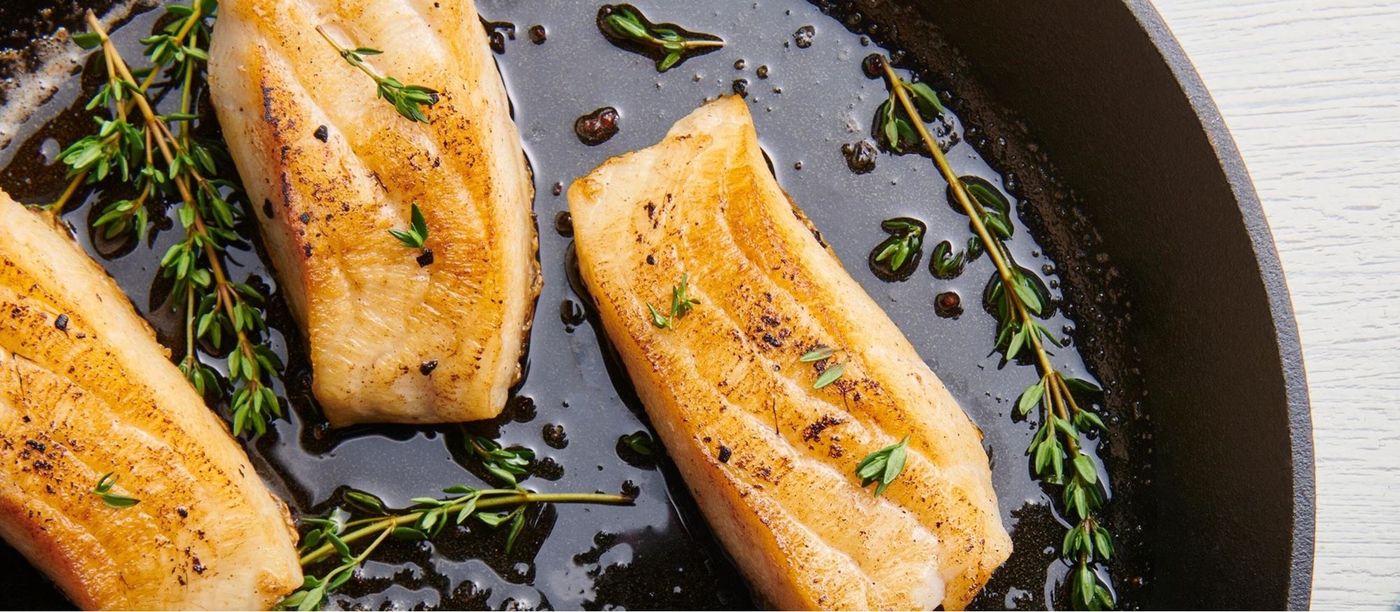 Easy and delicious Sea Bass with Chive-Garlic Compound Butter recipe using the Bake Mode setting of your Wolf Oven