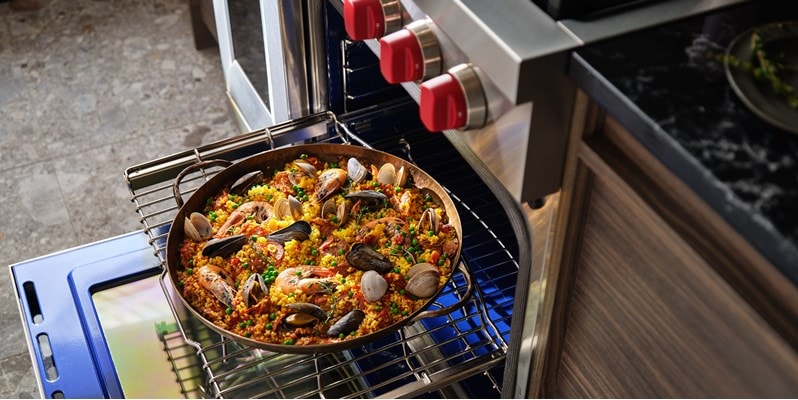 Wolf 48" Dual Fuel Range (DF48450CG/S/P) offers patented Dual VertiFlow™ convection system for consistent results.