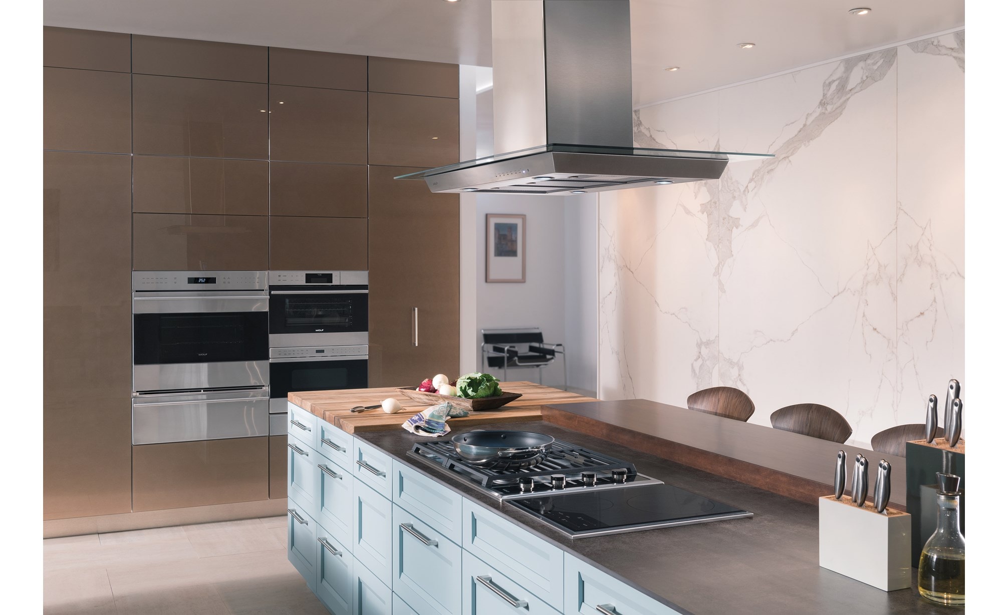 Wolf 30" Transitional Gas Cooktop 4 Burners (CG304T/S) paired with Wolf 42" Cooktop Island Hood - Stainless (VI42S) in modern kitchen