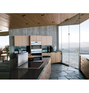 The Wolf 36" Transitional Induction Cooktop (CI365T/S) shown with 36" Downdraft Ventilation (DD36) in large smooth granite countertop
