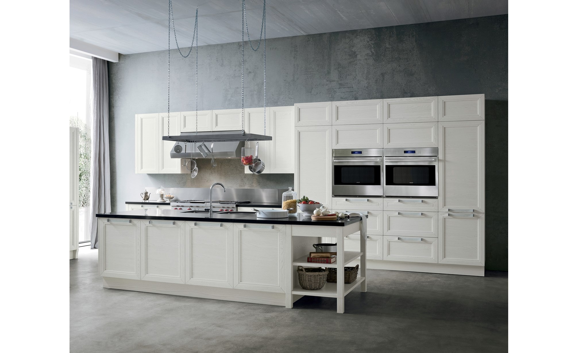 A Pair of Wolf 30" E Series Professional Classic Single Ovens (SO30PE/S/PH) displayed expertly within clean kitchen cabinetry.