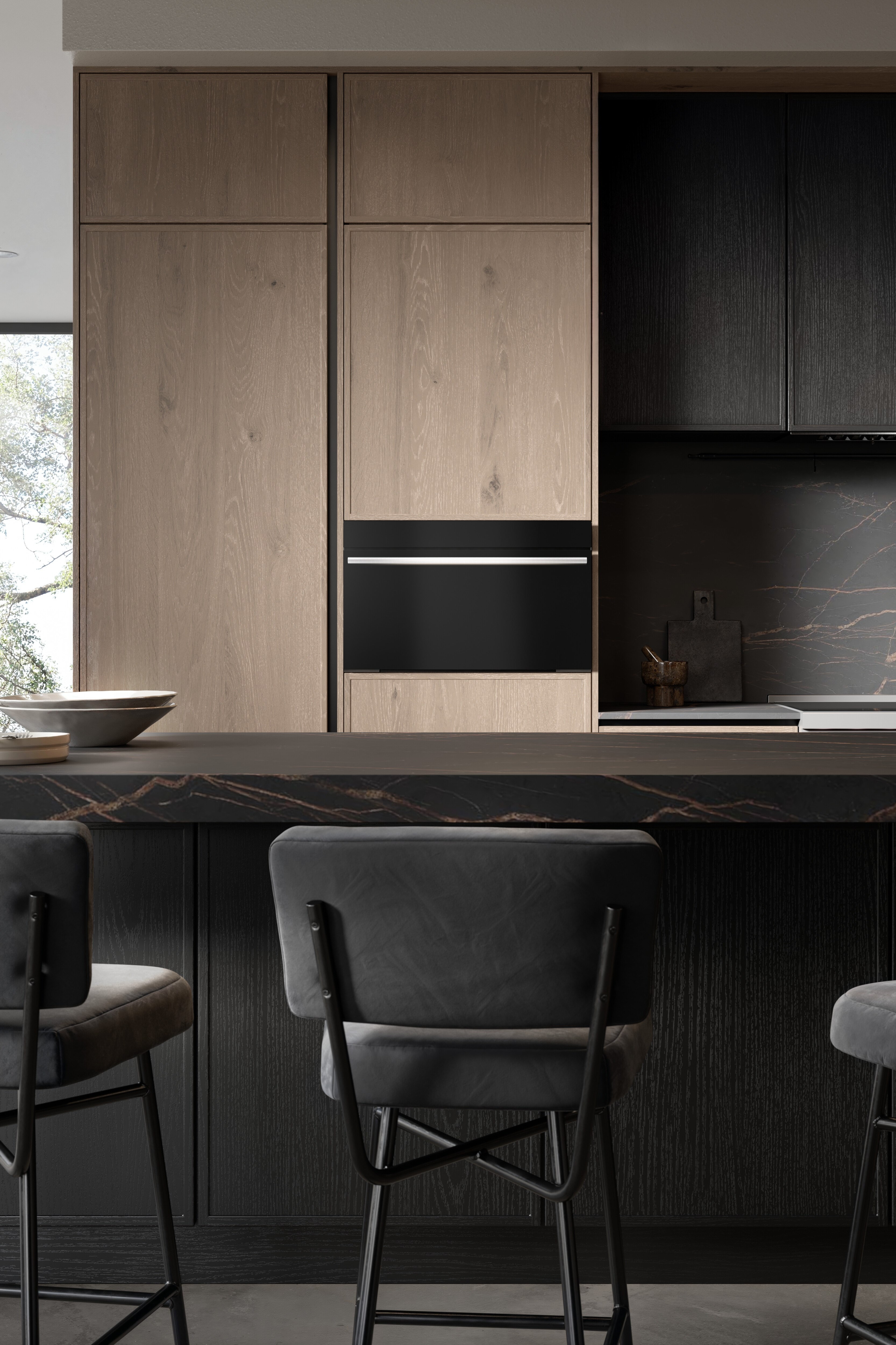 A close-up image of the Wolf 30" M Series Contemporary Speed Oven - SPO3050CM/B/T in a modern black kitchen