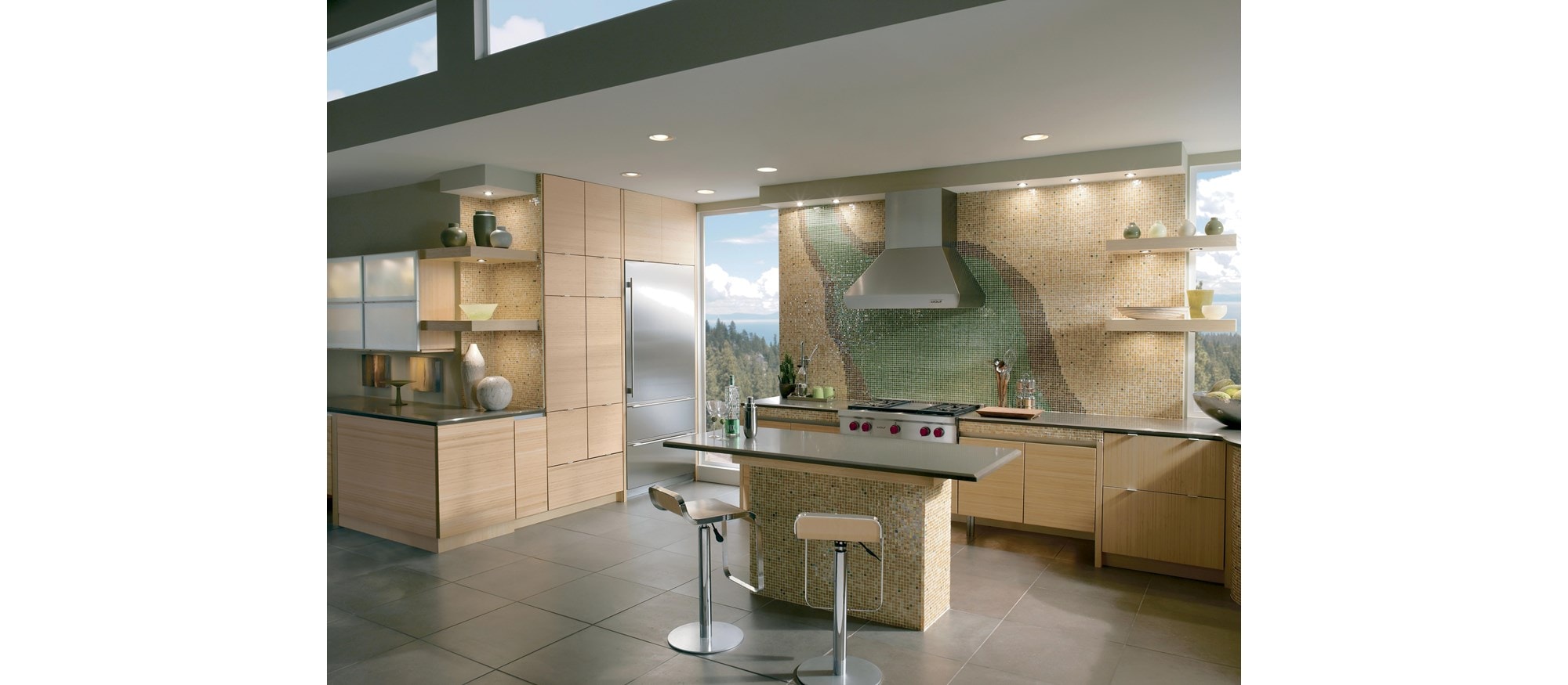 Wolf 36" Pro Wall Chimney Hood (PWC362418) shown is the finishing touch in this bright and open kitchen design featuring textured backsplash