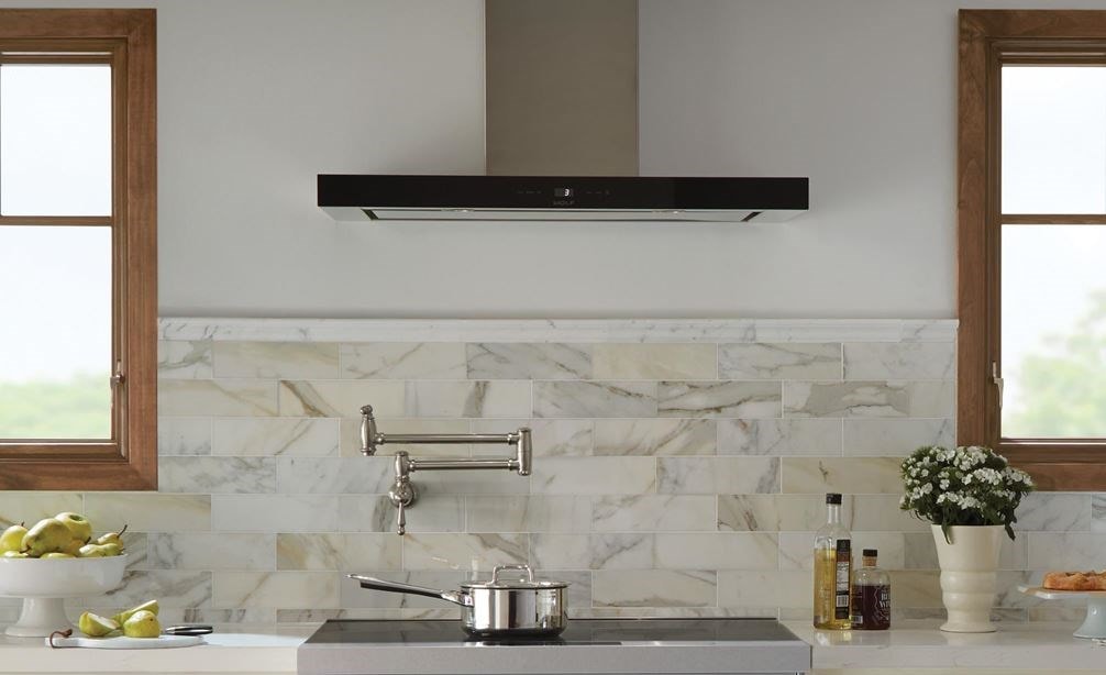 Wolf 36&quot; Cooktop Wall Hood - Black (VW36B) shown in a bright, open and clean design featuring classic country cabinetry and tile floors
