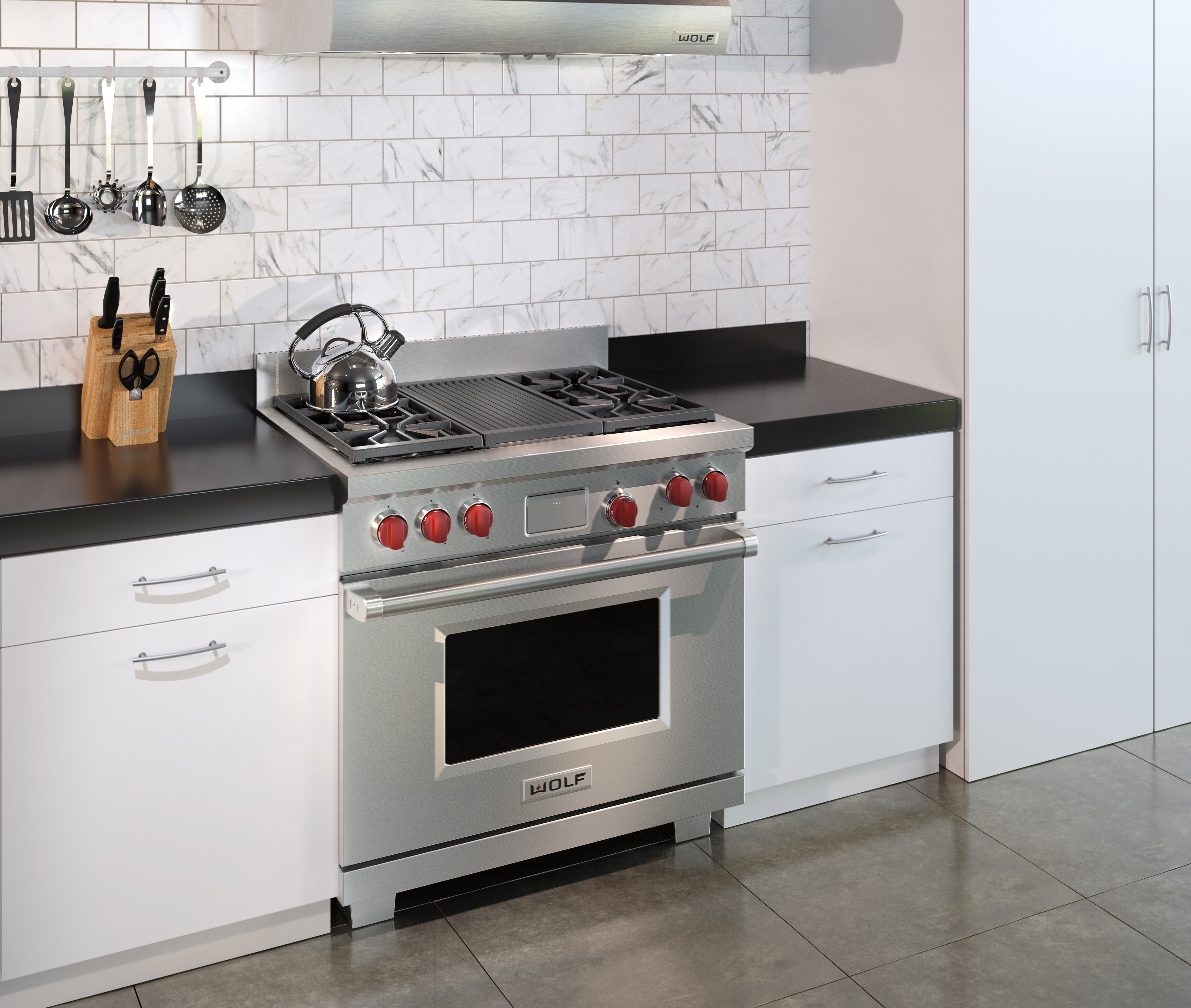 The Wolf 36" Dual Fuel Range 4 Burner Infrared Charbroiler (DF364C) shown in a clean contemporary kitchen design.