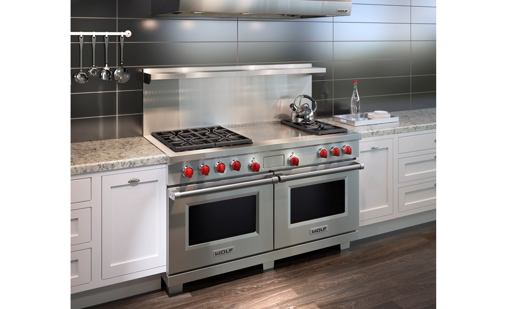 The Wolf 60" Dual Fuel Range 6 Burner French Top (DF606F) shown with light marble countertops along with classic white kitchen cabinetry