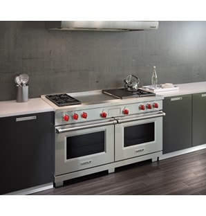 The Wolf 60" Dual Fuel Range 4 Burner Infrared Charbroiler French Top (DF604CF) visually satisfies when used with deep toned kitchen design