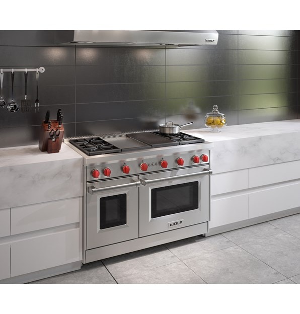 The Wolf 48" Gas Range 4 Burner Infrared Charbroiler Infrared Griddle (GR484CG) shown blending seamlessly into a sleek minimalist kitchen design