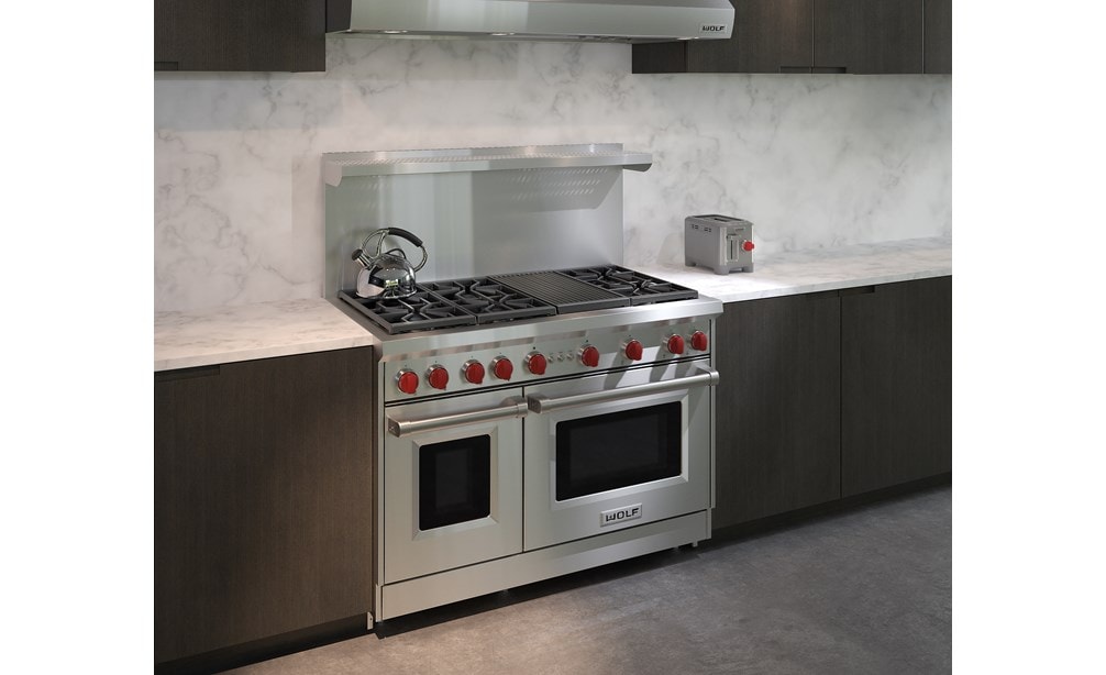 The Wolf 48" Gas Range 6 Burner Infrared Charbroiler (GR486C) with Wolf 48" Pro Wall Hood - 24" Depth (PW482418)