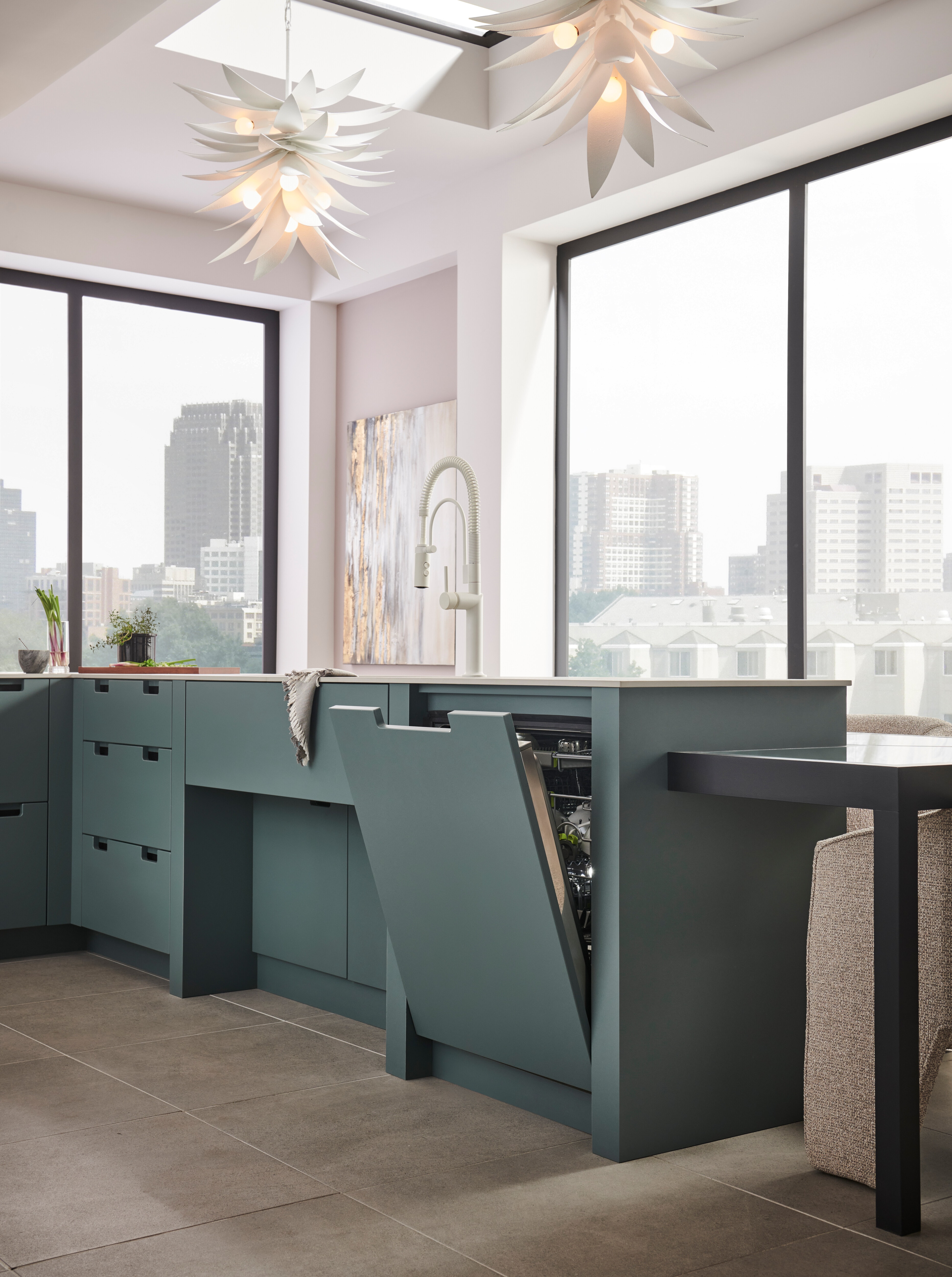 Cove panel ready dishwasher matched elegantly with the cabinetry in the kitchen.