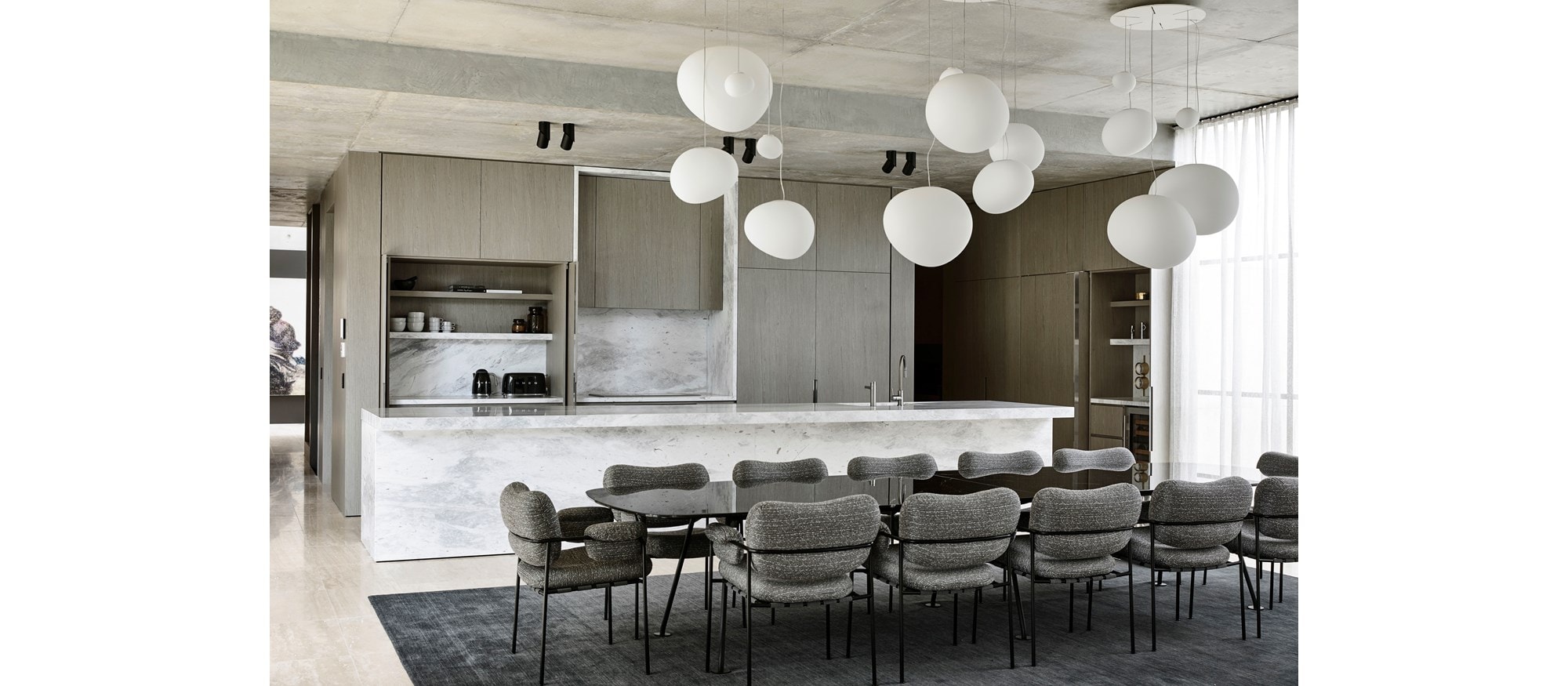 Sub-Zero, Wolf, and Cove 2nd Place Contemporary Design - KDC 2019-2021 Kenley Court Residence featuring IC-30RID 30" All Refrigerator Column with Internal Dispenser, IC-36FI 36" All Freezer Column with Ice Maker, ICBUW-24 24" Undercounter, ICBCI365T 36" Transitional Cooktop, OG36 36" Outdoor Gas Gril and ICBSO30CM/B 30" Contemporary Single Oven