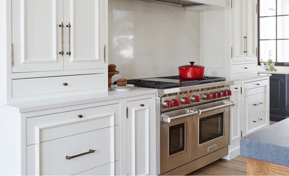 Wolf 48" Gas Range with red knobs in Forest Kitchen by Dan McFadden.