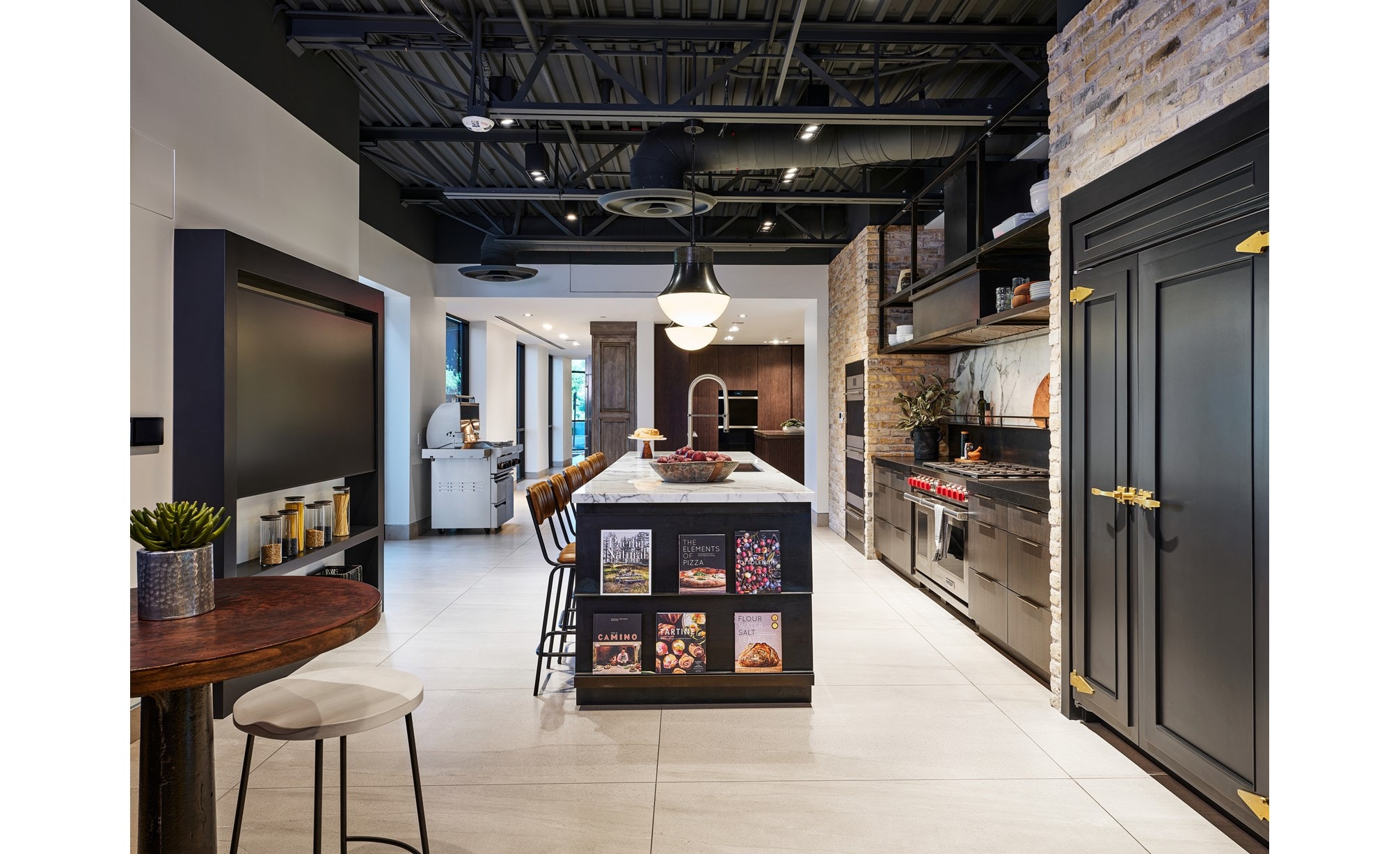 Sub-Zero, Wolf, and Cove appliances litter this traditional kitchen in our Scottsdale, Arizona, showroom.